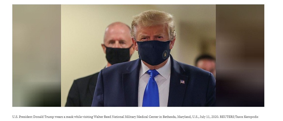 In first, Trump dons masks in visit to a military medical facility
