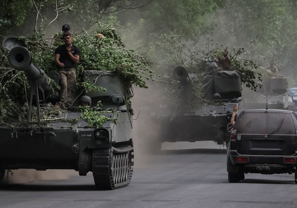 Russian forces cut off last routes out of eastern Ukraine city