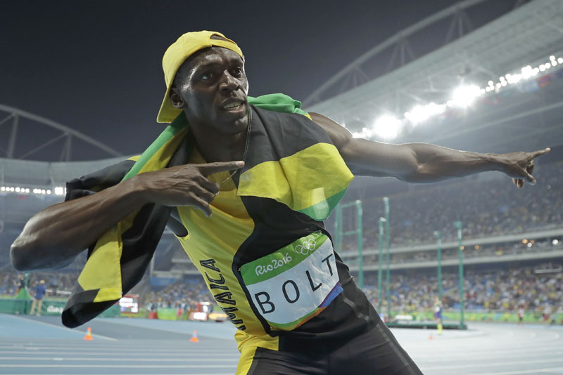 Bolt shines bright, wins another gold in Olympic 100