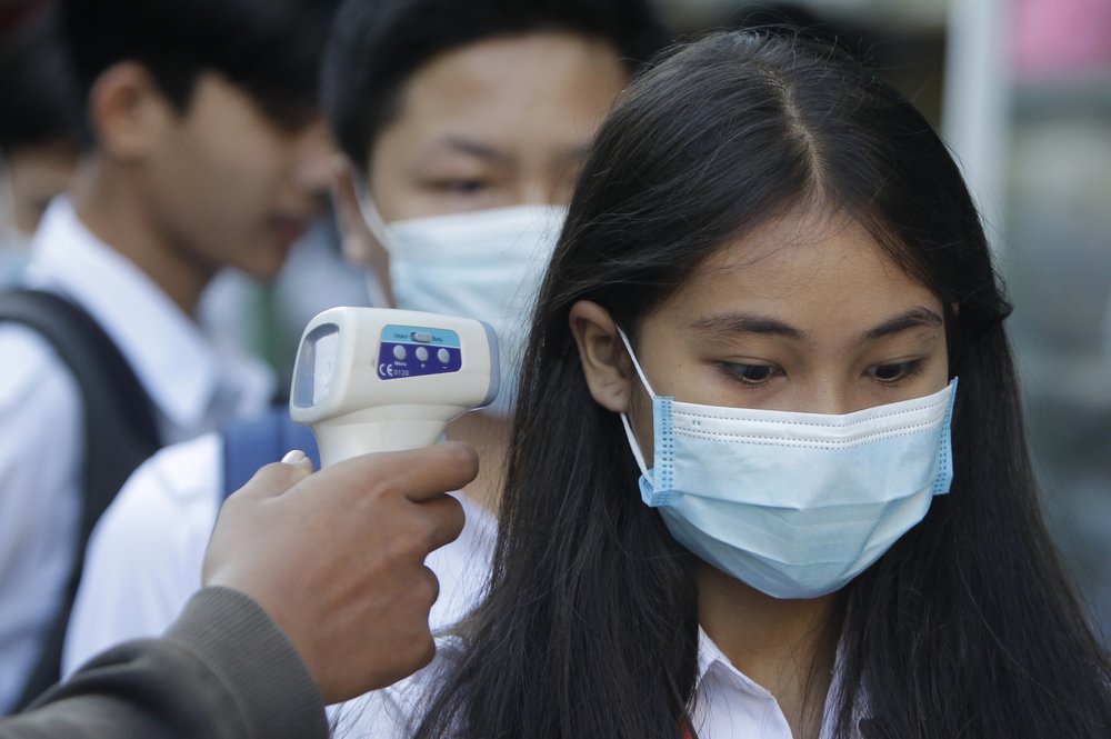 China tests millions amid new virus flare-ups