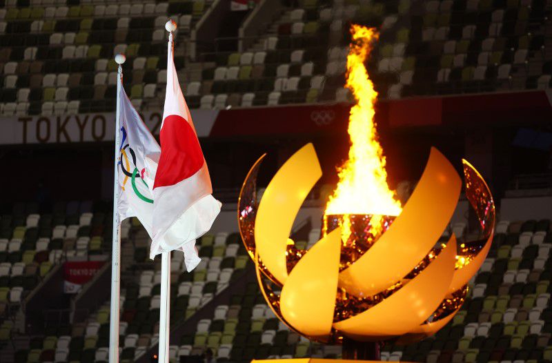 Japan to douse Olympic flame of Games transformed by pandemic and drama