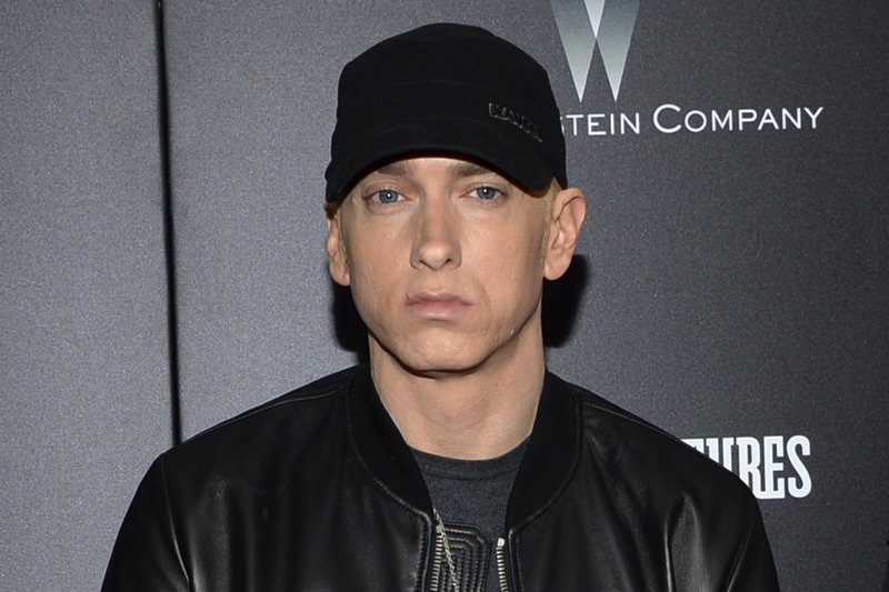 Eminem drops surprise album, advocates changes to gun laws