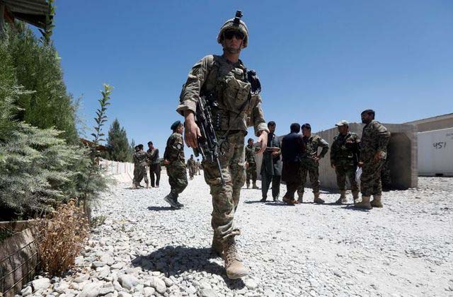 Foreign troops to stay in Afghanistan beyond May deadline - NATO ...