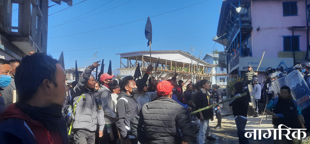 Identity supporters display black flags at Yogesh Bhattarai’s residence in Taplejung