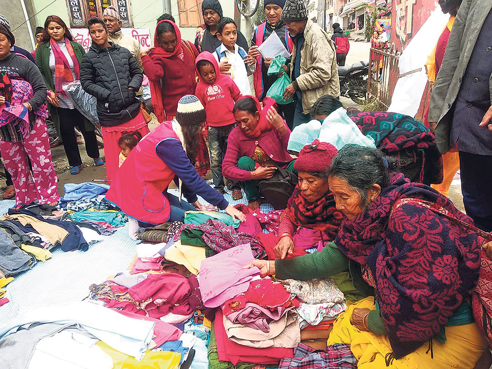 Leo Club distributing free clothes in Gorkha