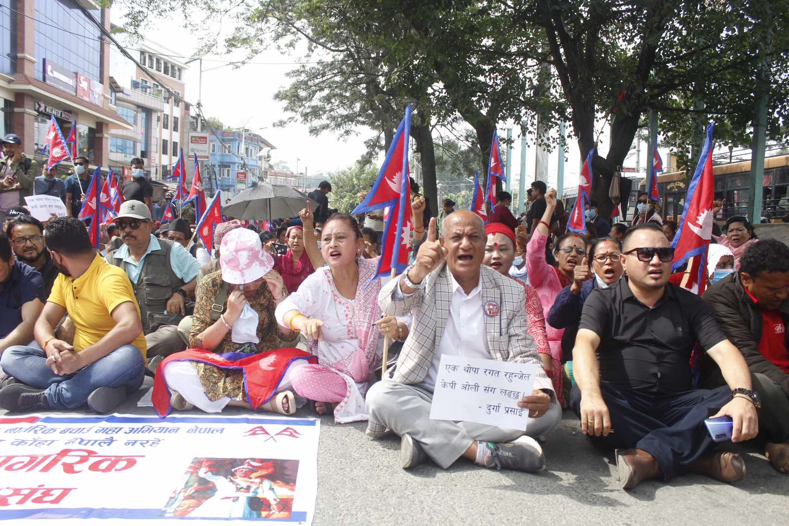 Supporters of Durga Prasai stage demonstration in Maitighar (Photo Features)