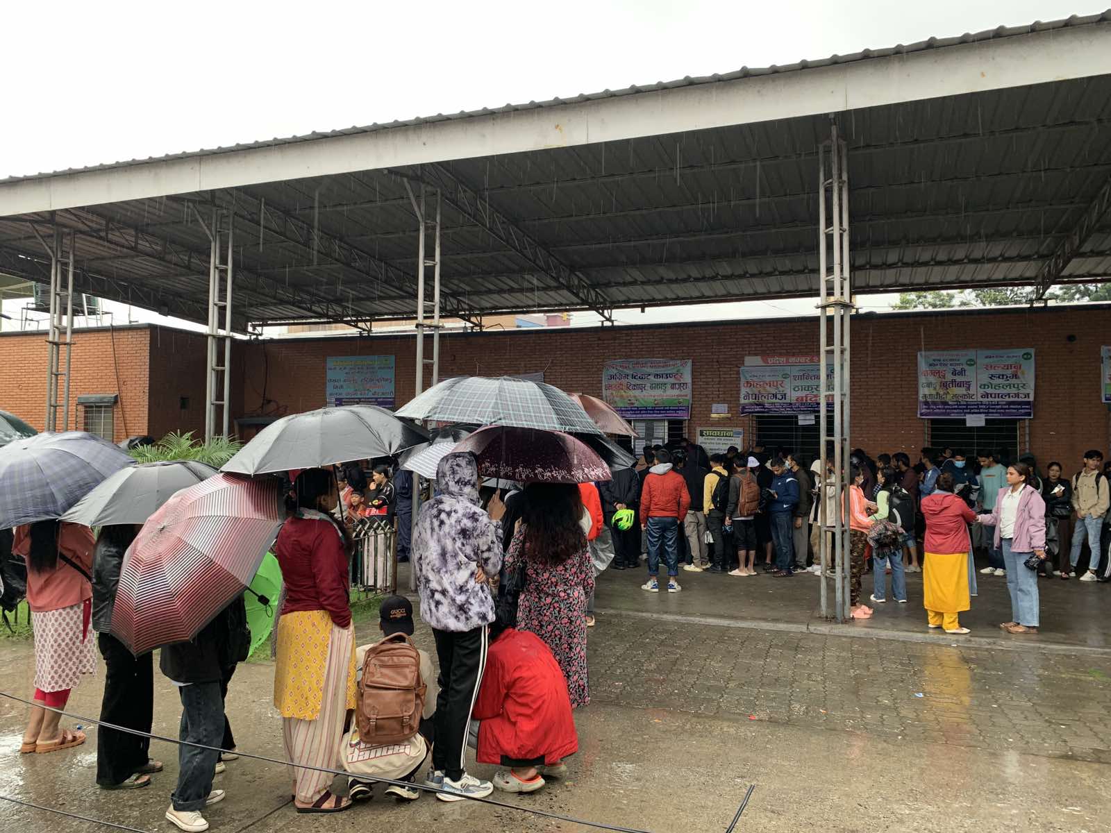 Crowd of people at Gongabu Bus Park to book tickets for Dashain travel (Photo Feature)