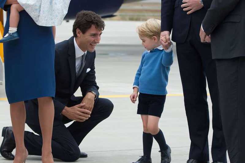 Young Prince George shuns high-five from Canadian PM
