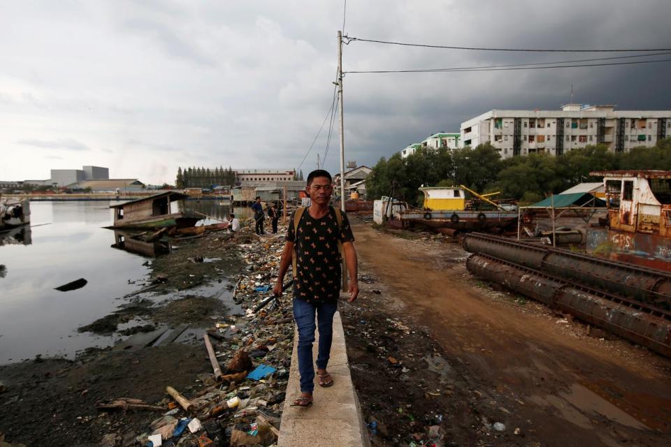 Crumbling seawall heightens worries over flood threat to Indonesian capital