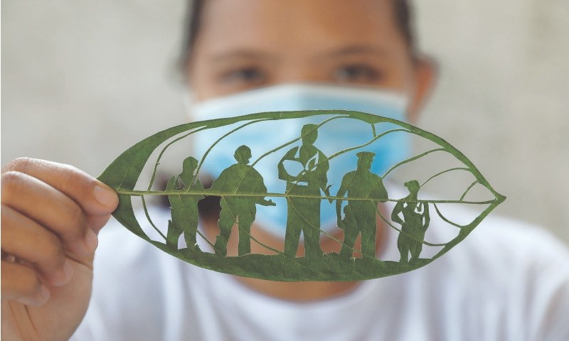 After factory layoff, Filipina cashes in on 'leaf art' venture