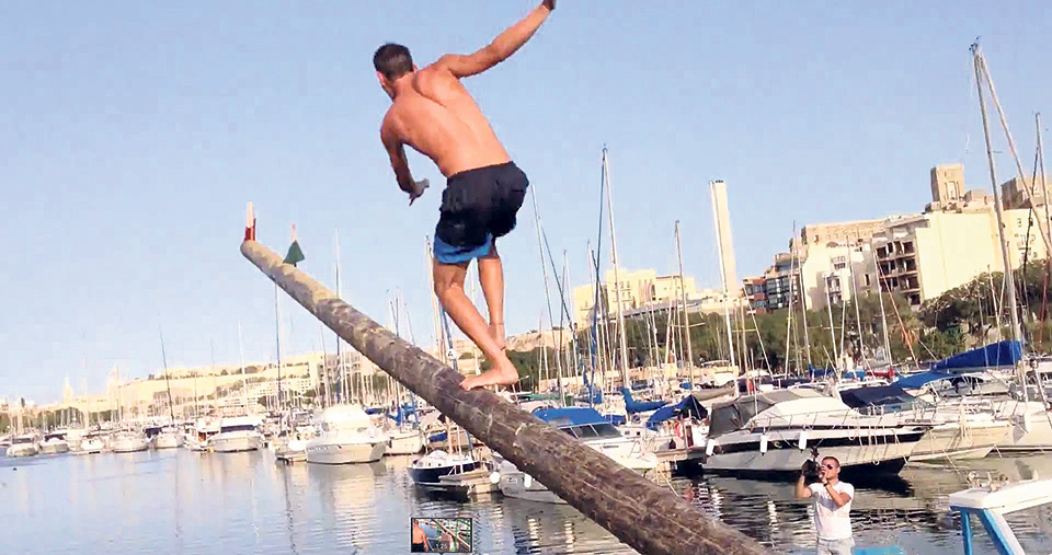 At Maltese festival, climbing greasy pole is part of the fun