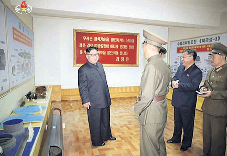 N Korea photos suggest new solid-fuel missile designs