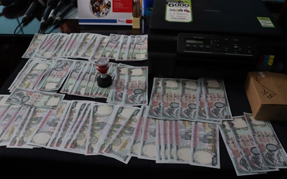 Three persons arrested with note-printing machine from Bouddha