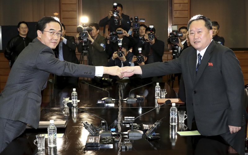 Rival Koreas begin high-level talks meant to set up summit