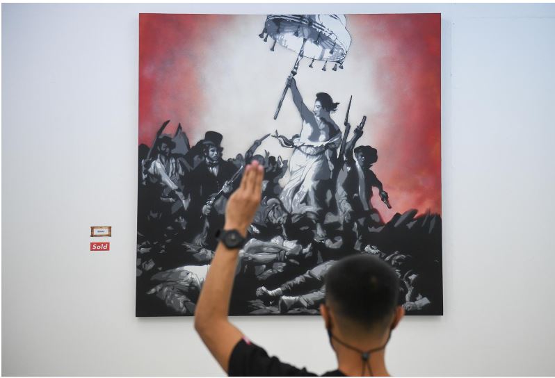 Thai artist tackles taboos with 'lese majeste' exhibition