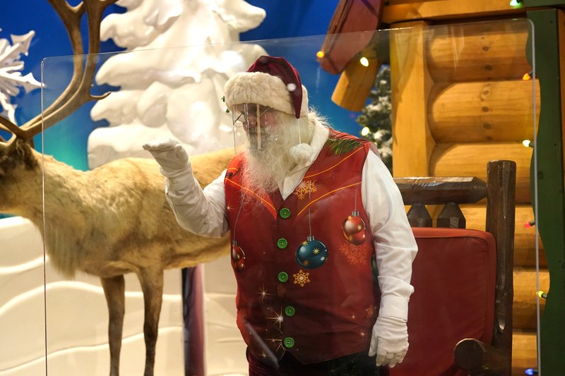 Ho, ho — Whoa! Virus keeping most Santas at a distance