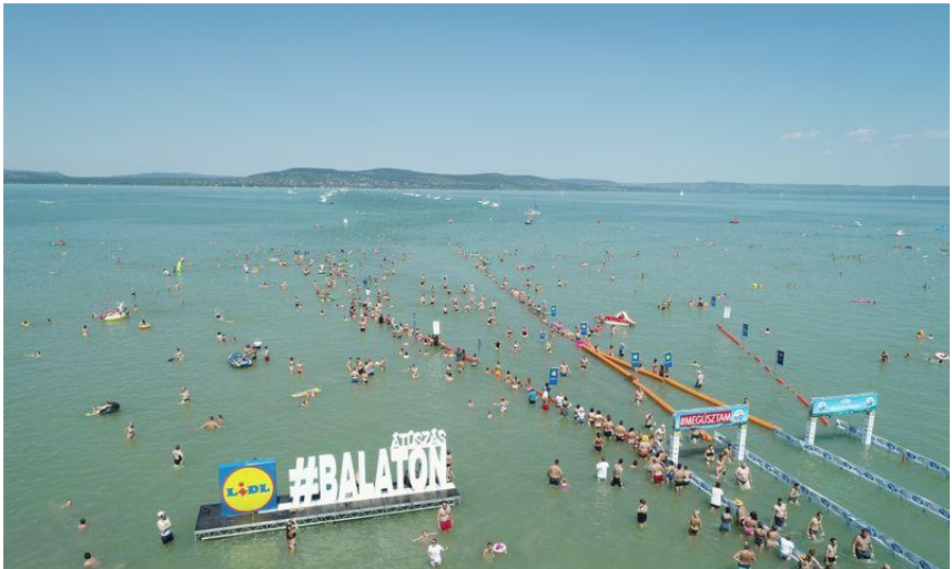 Thousands dive into balmy Lake Balaton in Hungary for swimming contest