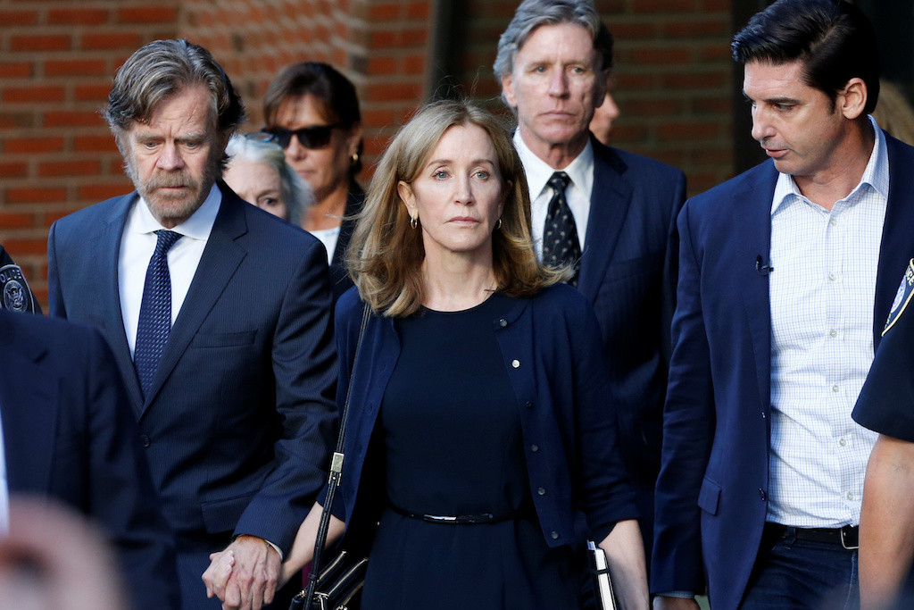 Apologetic actress Felicity Huffman gets 14-day sentence in U.S. college scandal