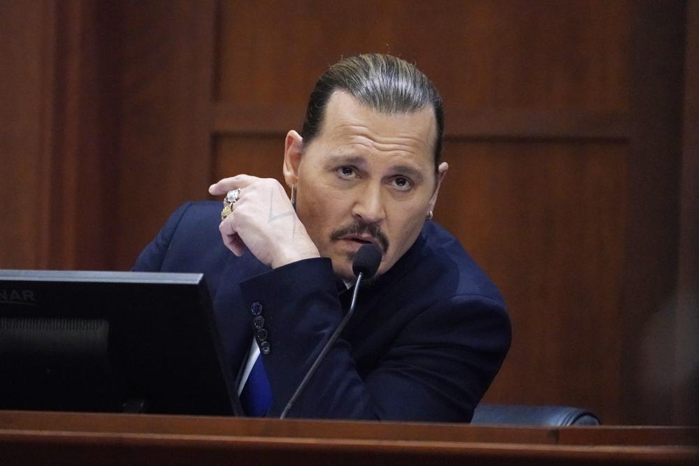 Depp finishes 4 days on stand; filed lawsuit to ‘fight back’