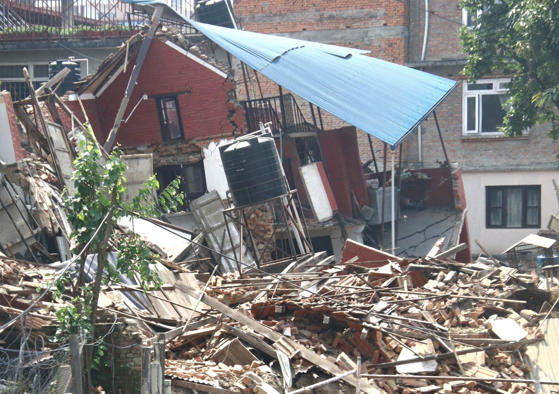 Houses collapse near Summit Apartments in Lalitpur