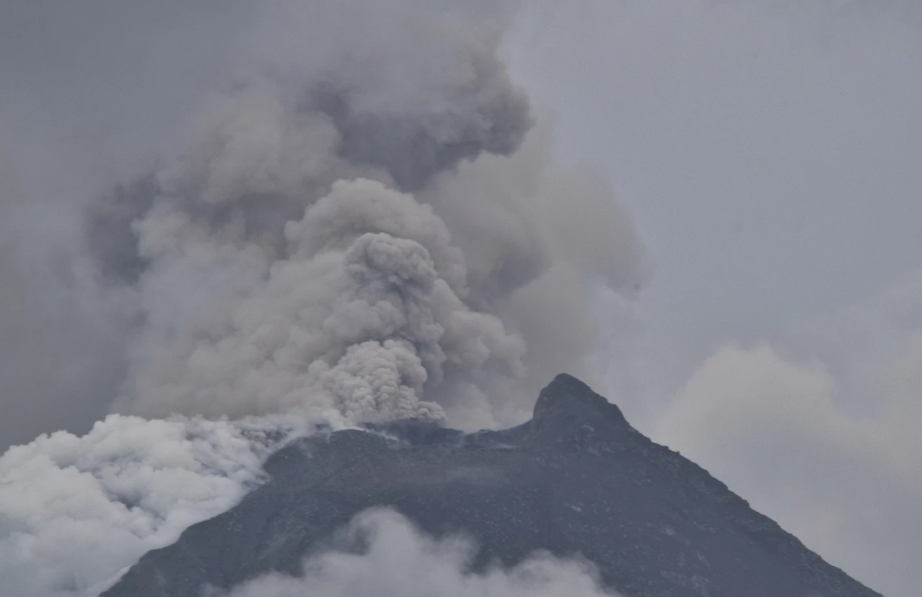 Indonesia evacuates about 6,500 people on the island of Flores after a volcano spews clouds of ash