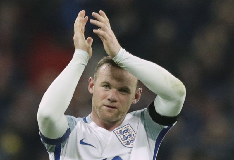 England's Wayne Rooney announces international retirement
