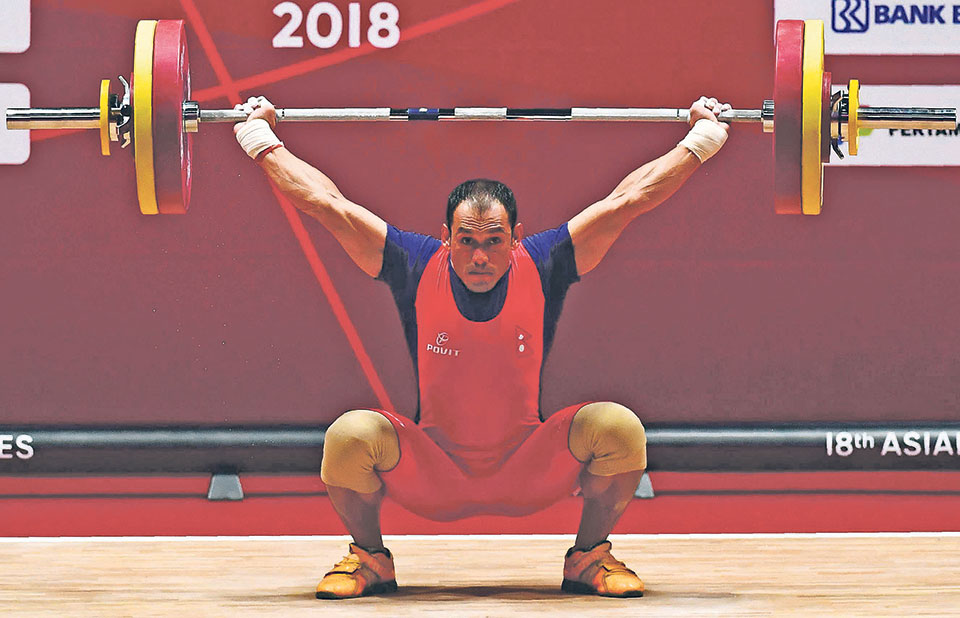 Kamal Adhikari improves national records in weightlifting